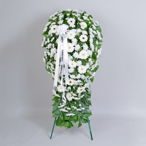 Gerberas & chrysanthemums in a stand